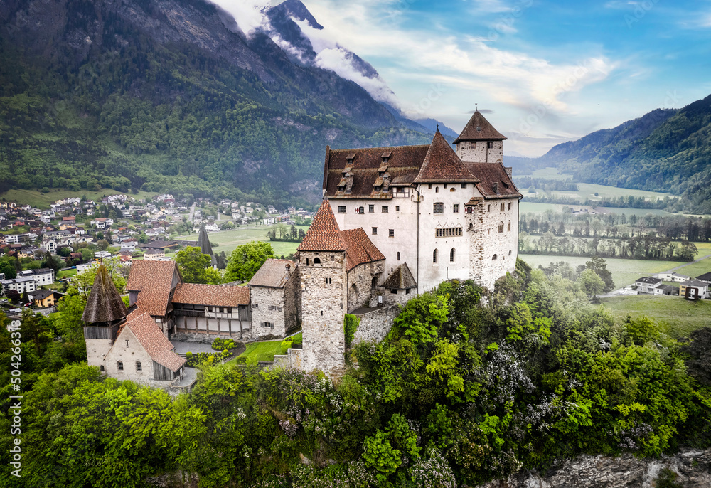 beautiful medieval castles of Europe - impressive Gutenberg in Liechtenstein, border with Switzerland, surrounded by Alps mountains, aerial view
