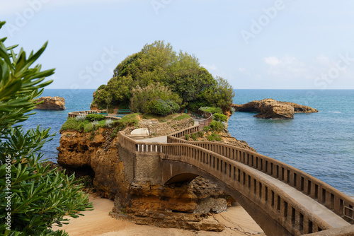 Bridge to the Rocher du Basta rock on the beach in Biarritz, France. photo