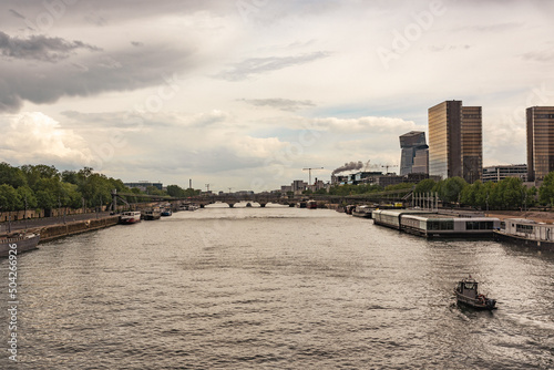 Dramatic sunset over Seine in Paris, France. Colourful travel background. Romantic cityscape.