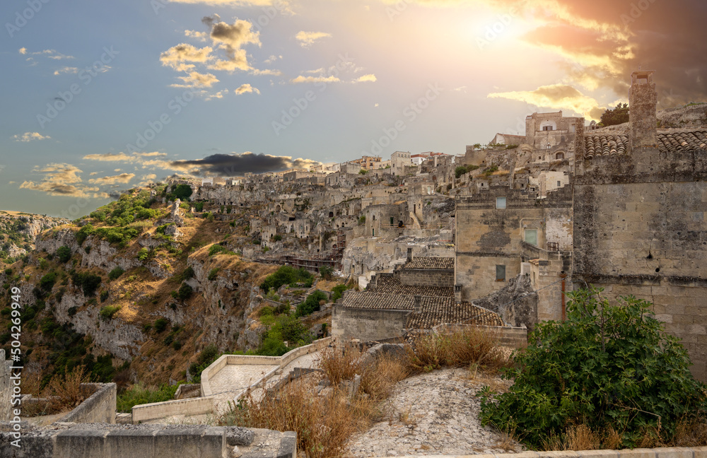 Matera, Basilicata, Italy. August 2021. Amazing view of the stones of Matera at the golden hour.