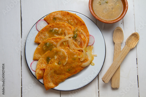 Basket tacos with green sauce. Mexican food