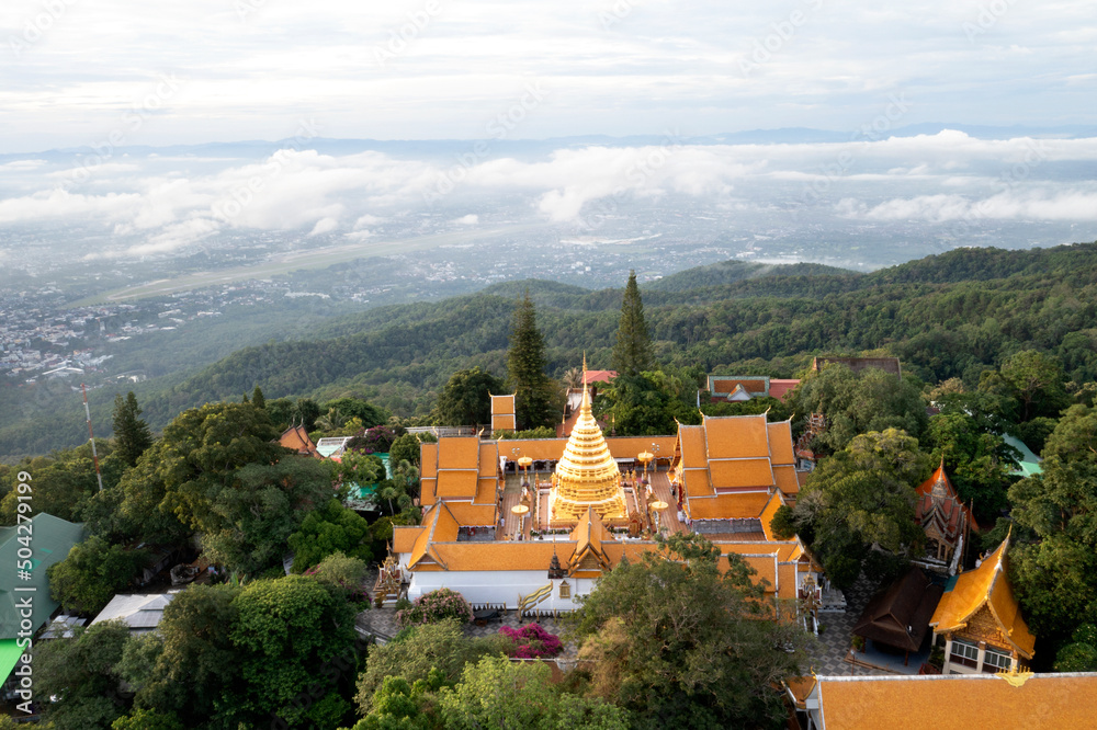 Aerial view at Wat Phra That Doi Suthep temple on the Cloudscape in Chiangmai, Thailand.