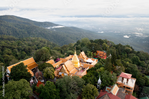 Aerial view at Wat Phra That Doi Suthep temple on the Cloudscape in Chiangmai, Thailand. photo