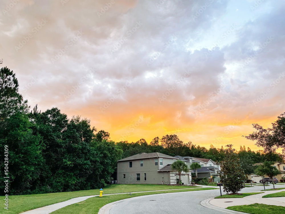beautiful sun set cloud in a community beautiful sun set cloud in a community