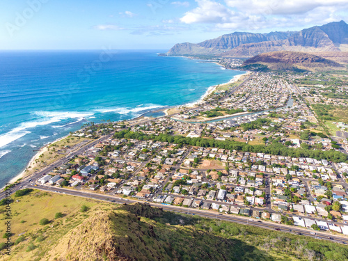 Aerial view of residental homes and the coastline along the west side of Oahu near Maili and Waianae Hawaii