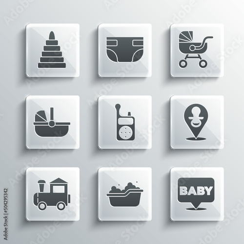 Set Baby bathtub, dummy pacifier, Monitor Walkie Talkie, Toy train, stroller, Pyramid toy and icon. Vector
