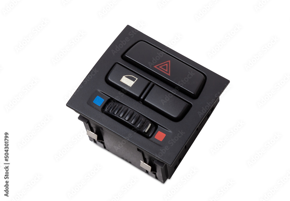 Black plastic block of car control panel with red emergency stop button for signal lights, spare part on a white isolated background in a photo studio for sale and installation in a auto service Black plastic block of car control panel with red emergency stop button for signal lights, spare part on a white isolated background in a photo studio for sale and installation in a auto service