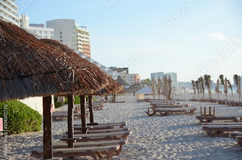 beach umbrellas and chairs on the beach