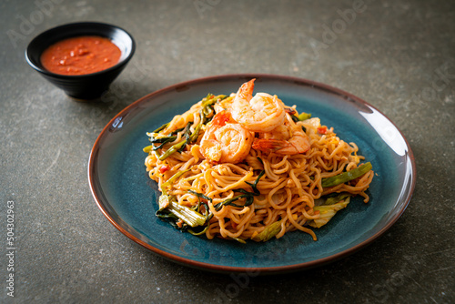 Stir-fried instant noodles sukiyaki with shrimps