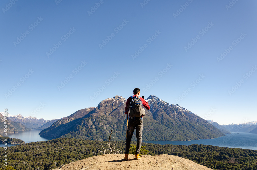 hiking man on top of the mountain