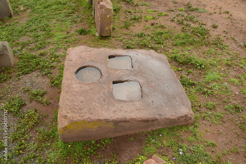 Stone walls uncovered by archaeologists at the Puma Punku, a UNESCO world heritage site. Tiwanaku, Bolivia photo