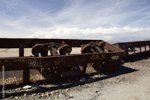 old rusty trains at the antique train cemetery close to the salt flats of Uyuni. Bolivia. photo