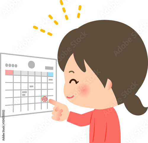 カレンダーに書き込んだ予定を指さす笑顔の女性