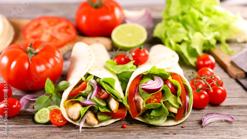 Fajita, tortilla wrap with grilled chicken and vegetables