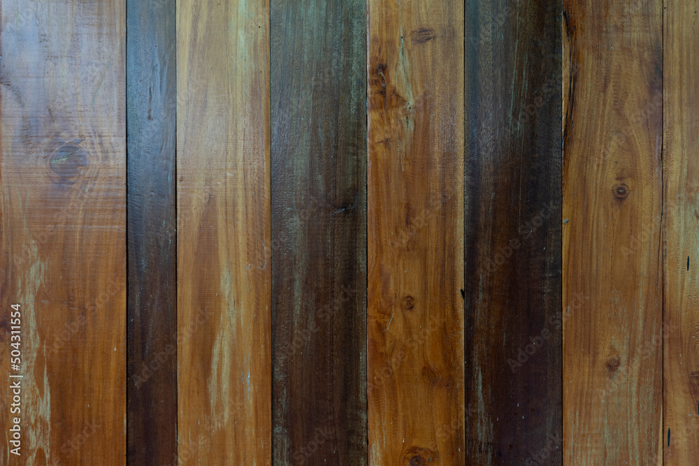 Naklejka premium Above view for background and textured of dark brown wooden planks alternate light. varnish with lacquer.