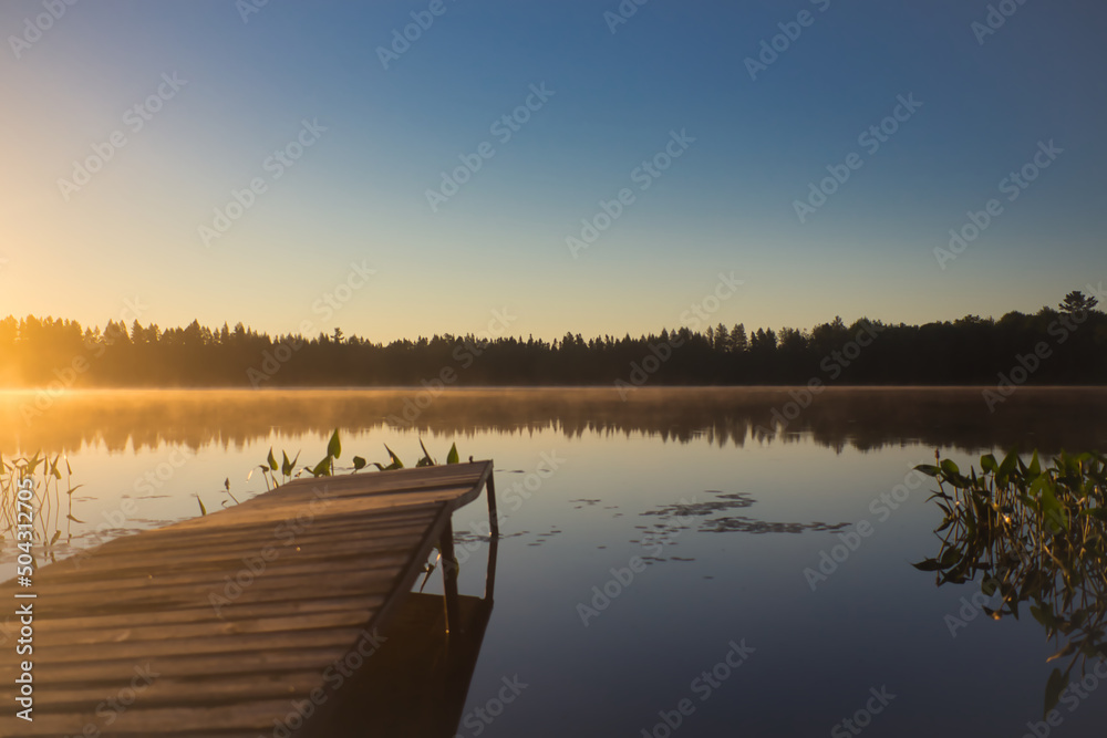 Sunrise over Lake with Dock