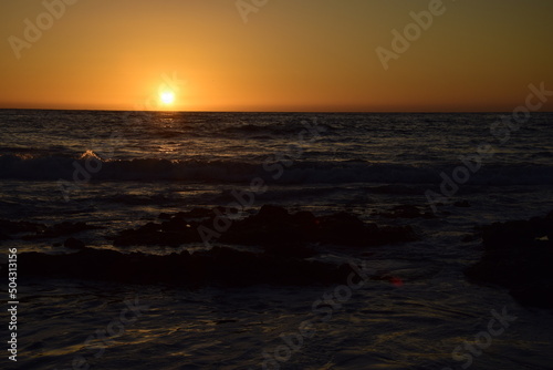 Sunset in the ocean  view from the embankment of Antofagasta  Chile.