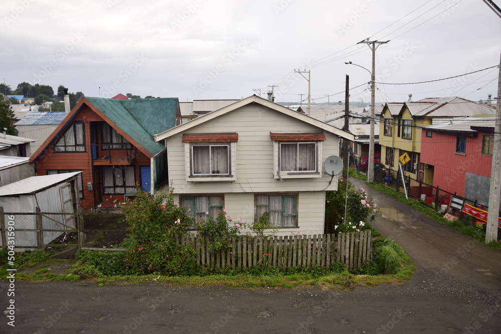 QUELLON, CHILE. Residential area with typical wooden houses QUELLON, CHILE. Residential area with typical wooden houses