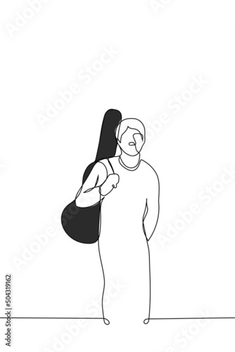 man standing with guitar case on his back - one line drawing. concept musician guitarist leaving or returning from rehearsal