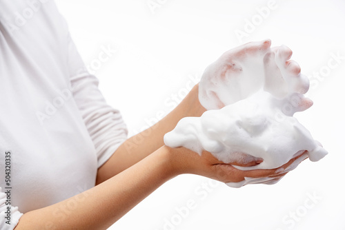 Wallpaper Mural Female holding soap bubbles on white background. Torontodigital.ca