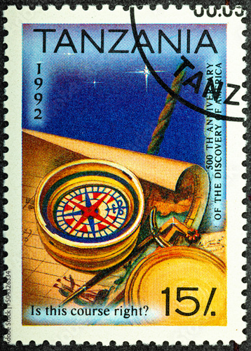 TANZANIA - CIRCA 1992: A stamp printed in Tanzania shows Map and Compass, 500th Anniversary of the Discovery of America serie, circa 1992 photo