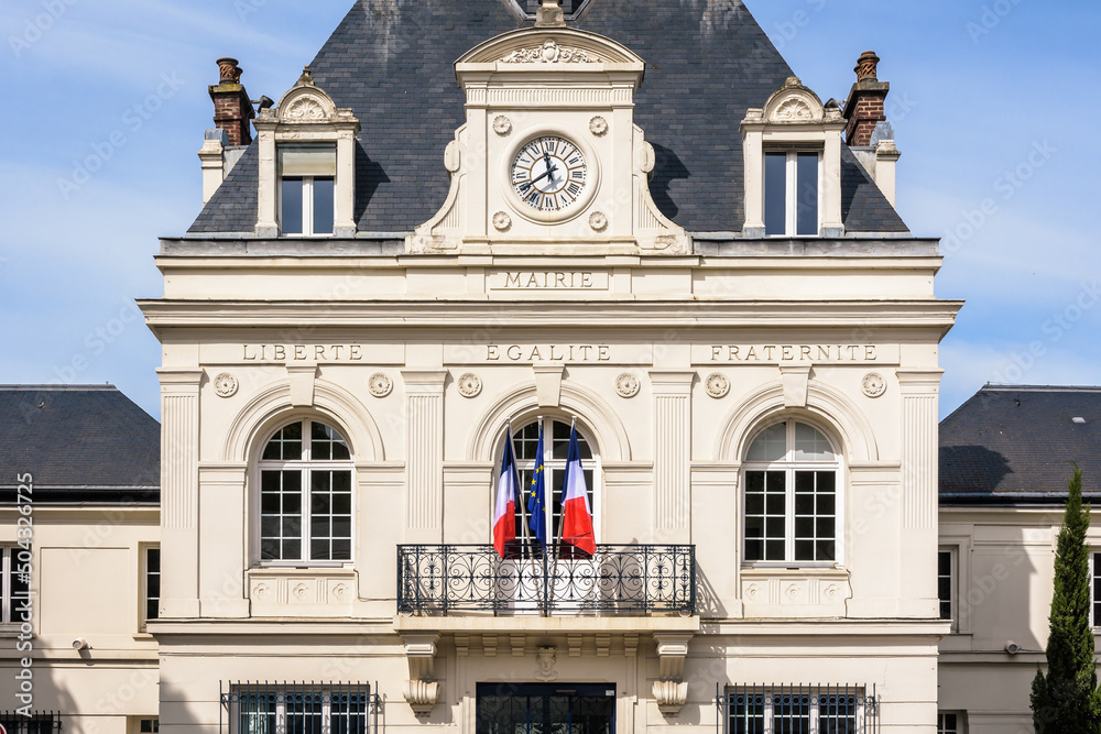Facade of a french city hall with national motto of France 