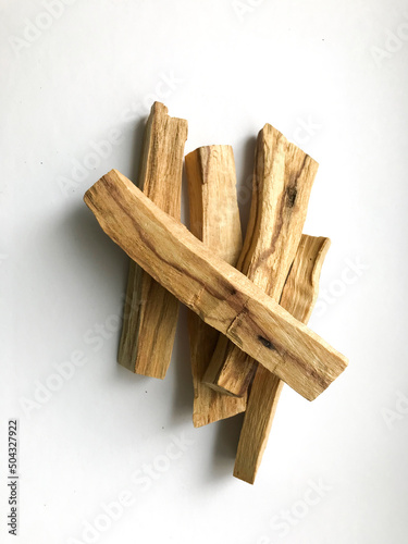 Set of wooden palo santo aroma sticks, natural incense top view, place for text