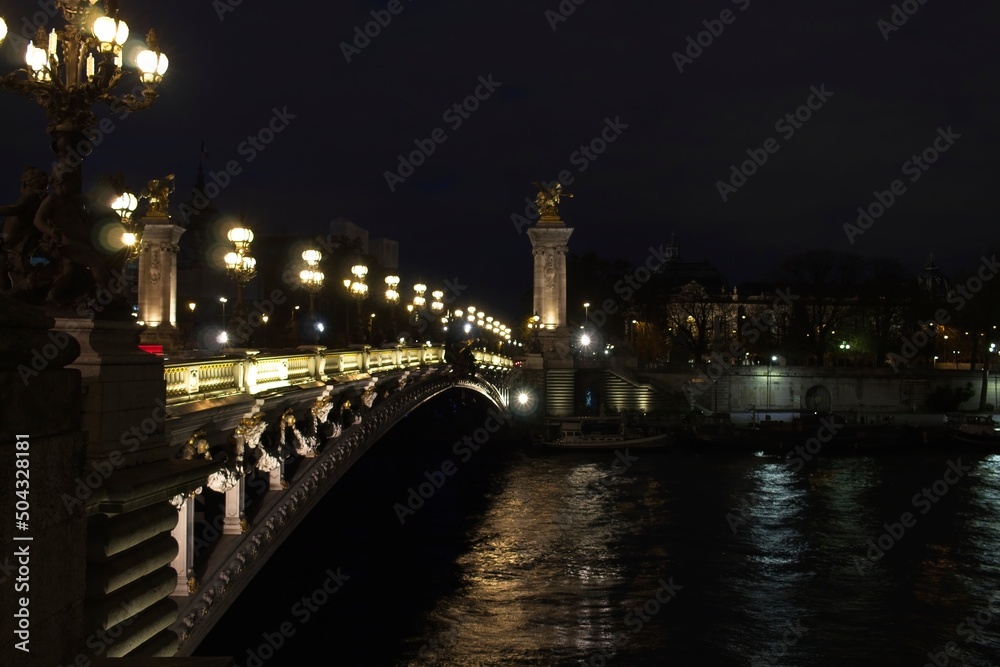 Fototapeta premium bridge over the river at night