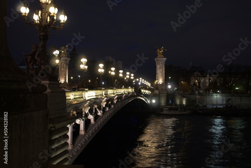 bridge over the river at night © Matthieu