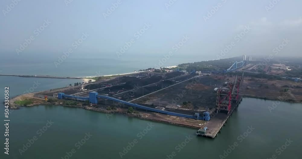 Aerial View Of New Mangalore Port On A Cloudy Day In India - drone shot Aerial View Of New Mangalore Port On A Cloudy Day In India - drone shot