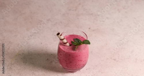 Raspberry smoothie in glass jar. Healthy refreshed homemade beverage.