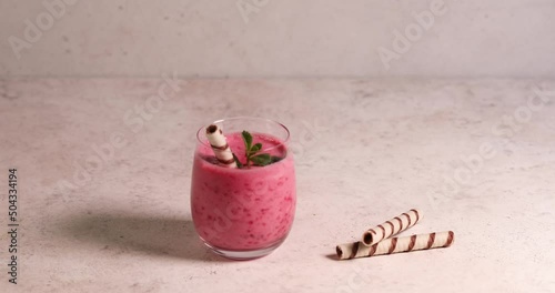 Raspberry smoothie in glass jar. Healthy refreshed homemade beverage.