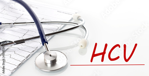 Medicine and health concept. On a white background stethoscope and text HCV photo