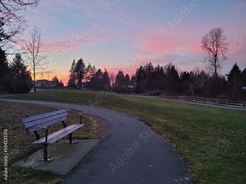 bench in the park at sunset