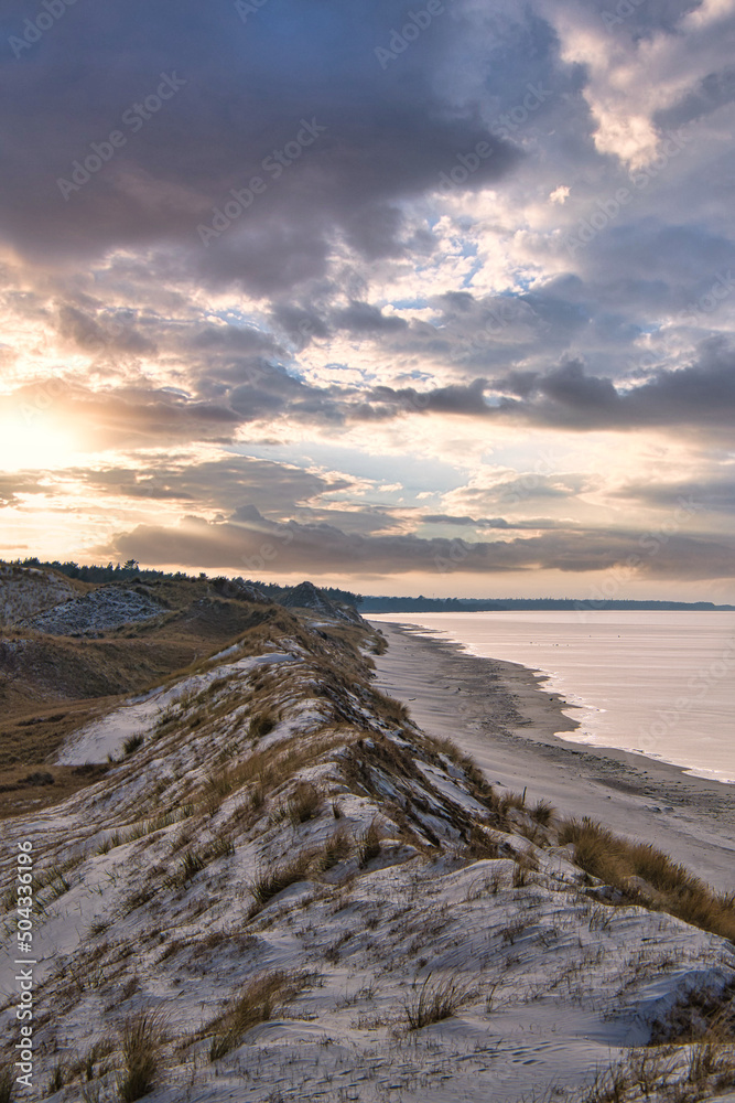 Dramatic sunset at the high dune on the darss. Beach, Baltic Sea, sky and sea.