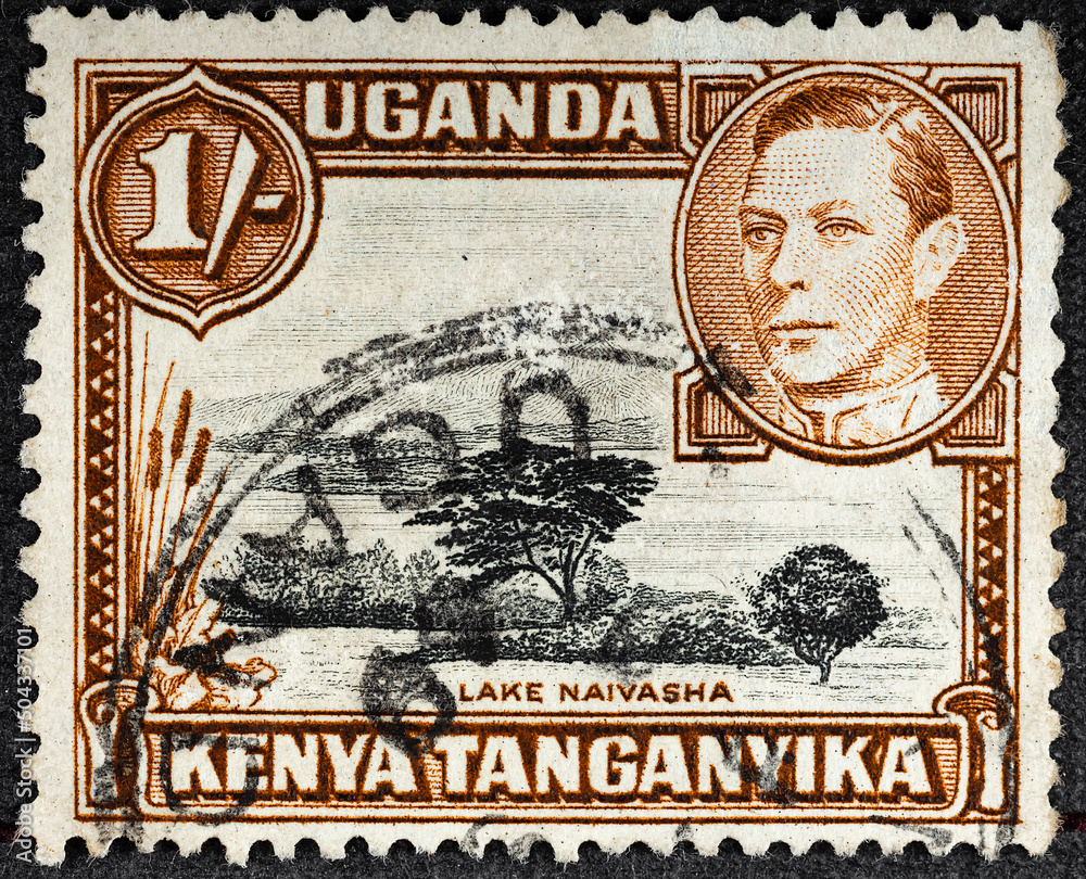 EAST AFRICAN POSTAL UNION - CIRCA 1938: A stamp printed in East African postal Union Kenya, Uganda, Tanganyika shows portrait of King George VI and lake Naivasha, circa 1938