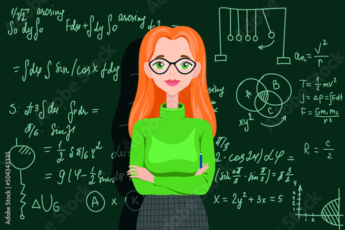 Female teacher standing near chalkboard in classroom