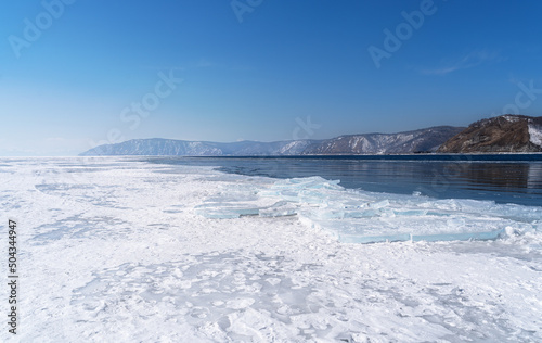 Fototapeta Naklejka Na Ścianę i Meble -  Winter landscape with mountains and Lake Baikal in Siberia on sunny day. Natural background.