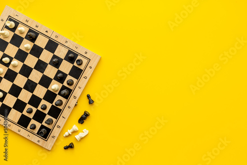 Leinwand Poster Chess pieces battle on chessboard. Teamwork concept