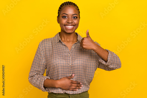 Canvas Photo of cheerful positive lady dressed checkered shirt arm stomach showing thum