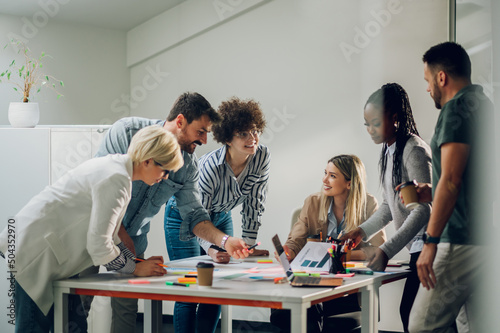 Multiracial business team on a meeting in a modern bright office