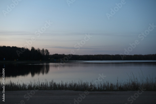 sunset at coast of the lake. Nature landscape. Landscape during sunset.