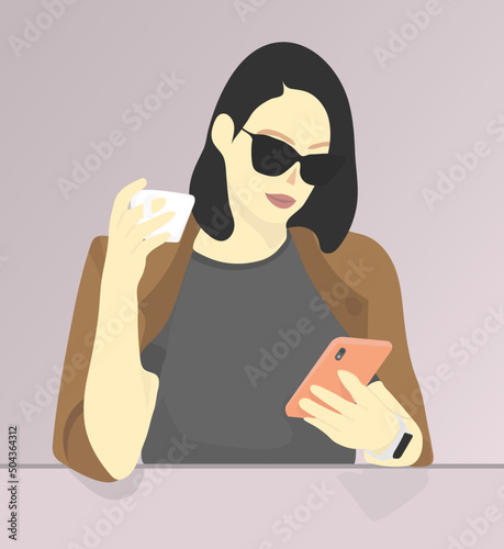 girl hangout in coffee shop holding a phone