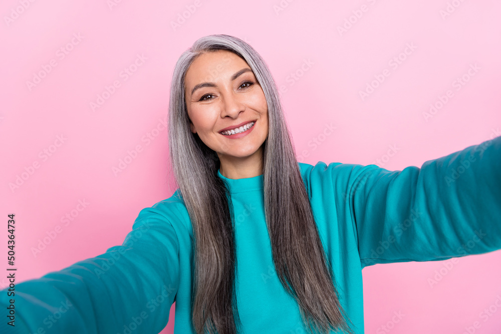 Portrait of positive person take selfie toothy smile have good mood isolated on pink color background