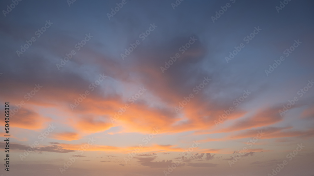 Wonderful pastel sky with clouds at sunset as natural background.