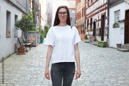 Woman wearing white t-shirt in the city