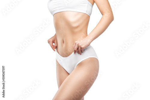 Slim woman in white lingerie. The concept of proper nutrition and a healthy lifestyle.