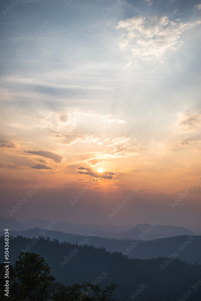 Sunset in the mountains in Pai, Thailand. Smog from the burning season.