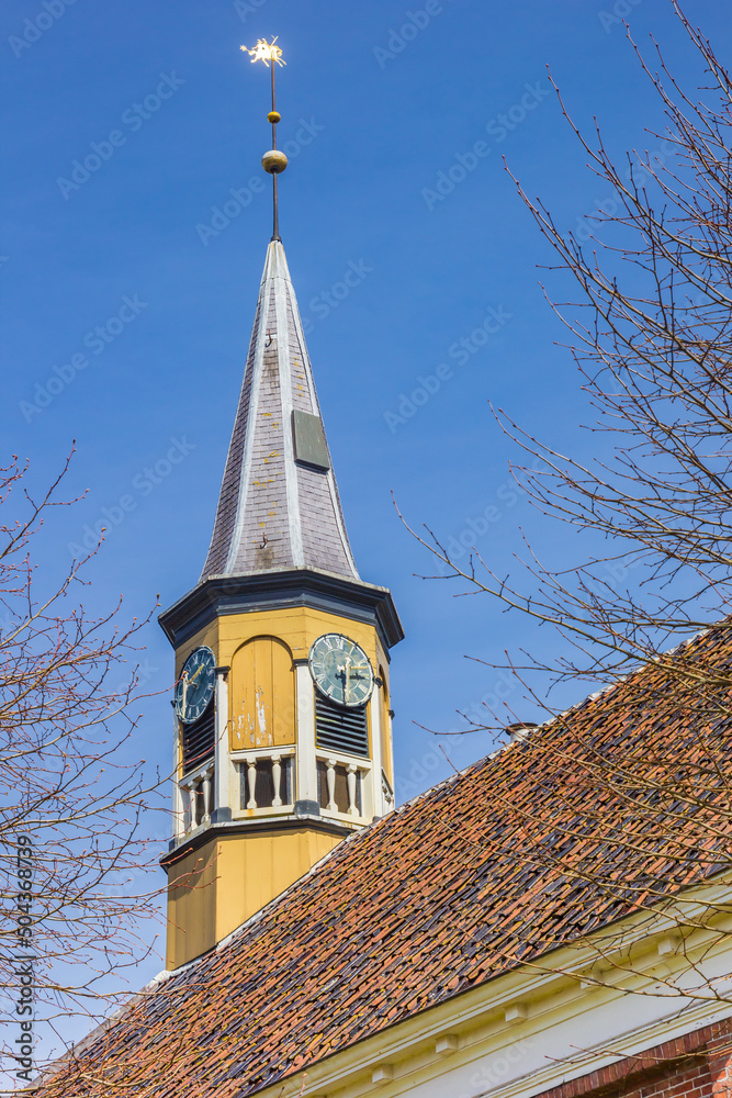 Tower and clock of the historic reformed church in Onderdendam, Netherlands