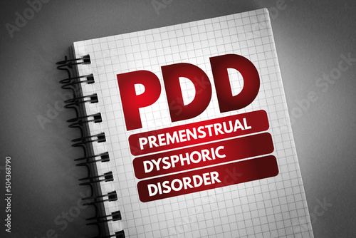 PDD - Premenstrual Dysphoric Disorder acronym on notepad, medical concept background photo
